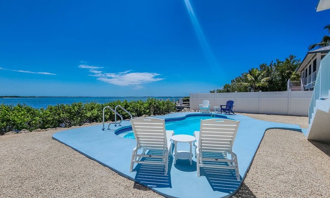 Breezeswept Beach Estates Casa | Low Key Sunrise: Waterfront pool home