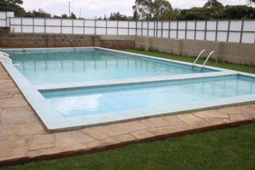 Hospital Apartamento | Lux Suites Milimani Executive Apartments