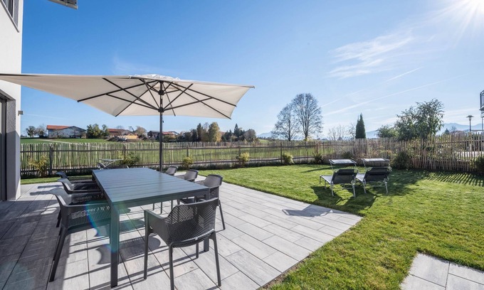 Gstadt Casa | Lujosa casa de vacaciones de diseño con vistas a la montaña, chimenea y jardín
