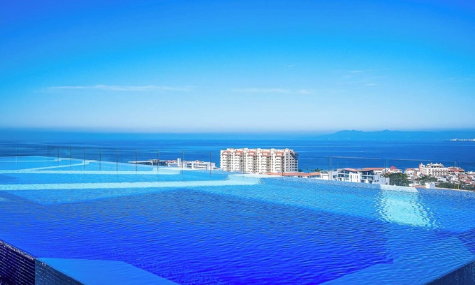 Emiliano Zapata Condominio | Luxurious 2800 sq ft 3 bed/3 bath view condo in Puerto Vallarta, gym + parking!