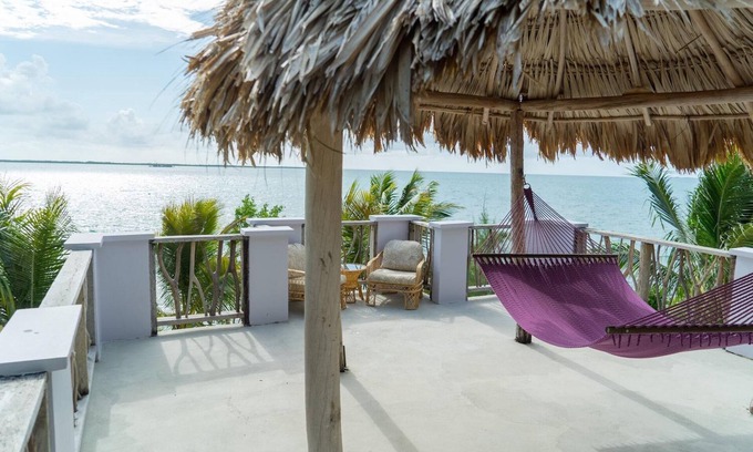 Thatch Caye Complejo | Luxurious Air-Conditioned Cabana w/ Rooftop Patio & Amazing Caribbean Sea Views