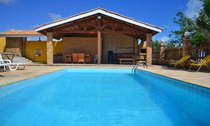 Sucatinga Casa | Lujosa casa de playa con piscina, terraza frente al mar.