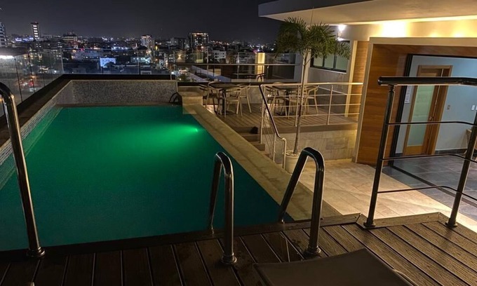 Ensanche Quisqueya Apartamento | Luxurious Downtown Apt, Rooftop Pool, Gym
