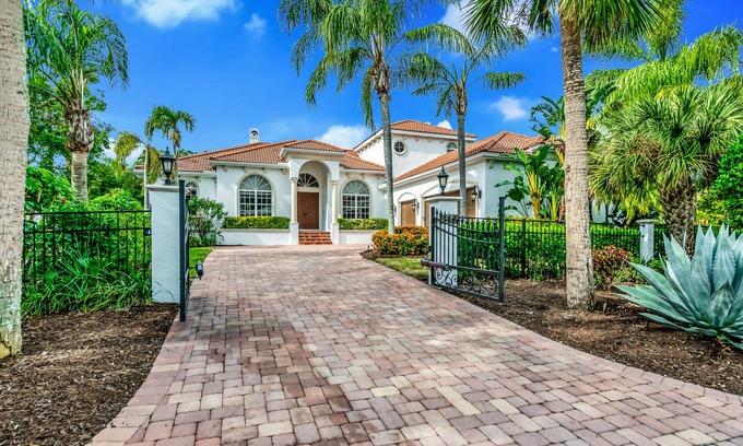 Bay Isle Casa | Luxurious Paradise with Tiki Bar and Heated Pool, Just Remodeled!