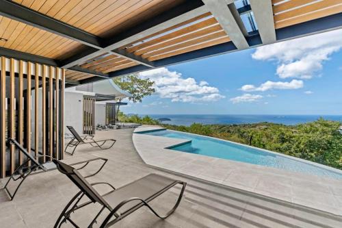 Rio Seco Casa | Luxurious Ultramodern Property with Private Suites, Infinity Pool, and Sweeping Ocean and Mountain Views