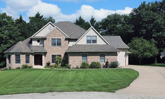 Geneseo Casa | Luxury 5 BR home on private wooded lot near QC, w/hot tub, rec & fitness room