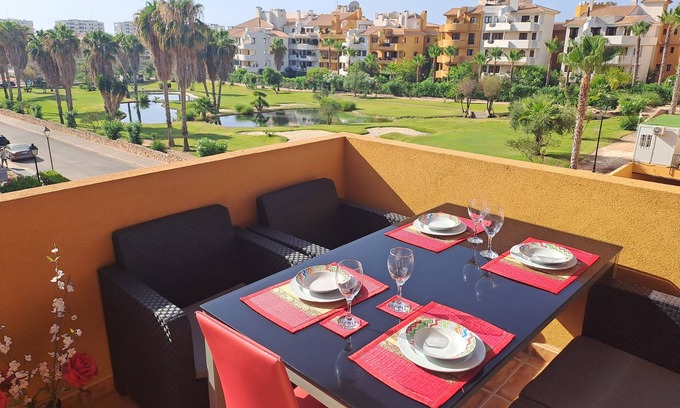 Punta Prima Apartamento | Apartamento de lujo con 3 piscinas en un jardín tropical con vistas al mar
