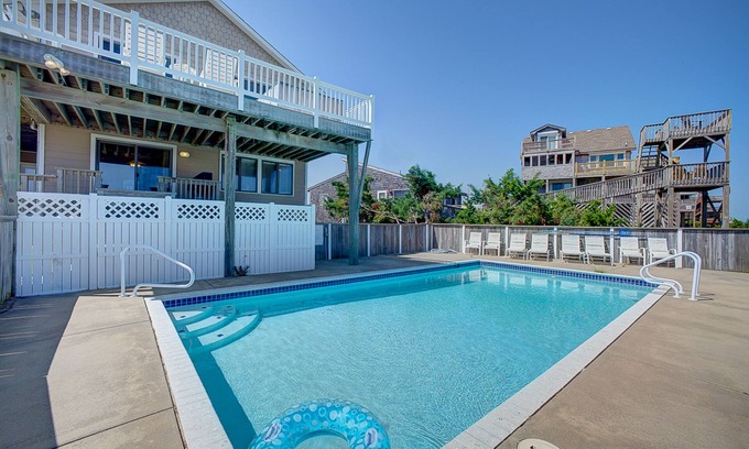 Avon Casa | Luxury beach home with beach view, private hot tub, & fireplace