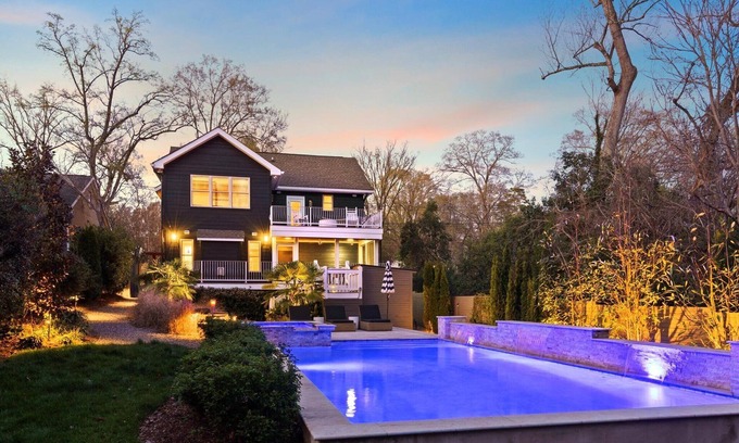 Commonwealth Park Casa | Luxury Charlotte Home with Stunning Pool & Hot Tub & Waterfalls