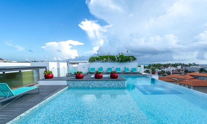 Zazil-ha Condominio | PARADISE en PLAYA; Condominio de lujo con piscina en la azotea 2bd / 2. 5 baños, Para toda la familia