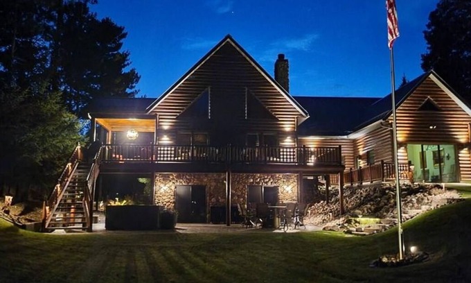 Chippewa Falls Casa | Luxury House on Lake Wissota w/Private Beach, Docks, Hot Tub, Fire Pit and More