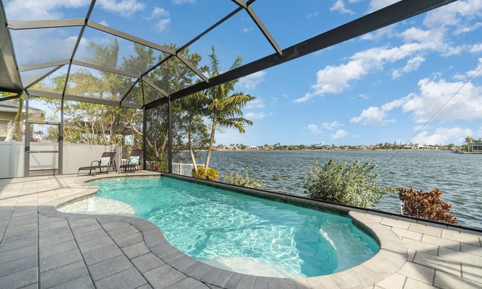 Cape Coral Casa | Luxury Lakeside Living w/Outdoor Kitchen & Heated Pool