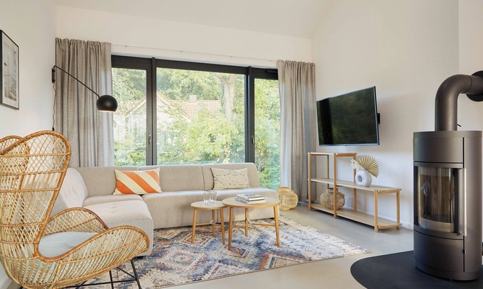 Hohwacht Apartamento | Luxury loft apartment with rooftop terrace and fireplace.