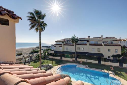 Marina de Casares Casa | Luxury modern beachfront 3 bed gated community townhouse with pool, sun terrace, sea views close to all amenities