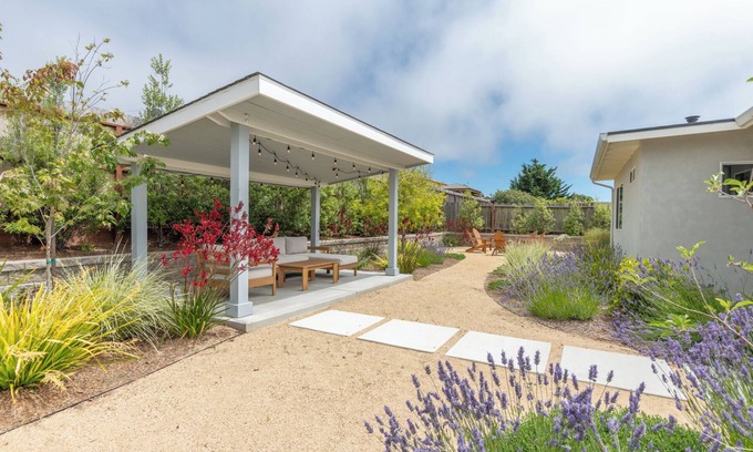 Seaside Casa | Luxury modern home with backyard and golf simulator!