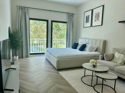 Discovery Gardens Apartamento | Luxury Modern Studio I Discovery Gardens