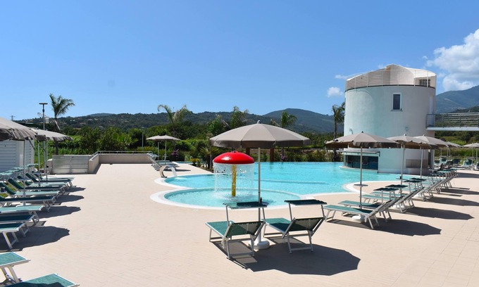 Casal Velino Apartamento | Luxury Oasis: Apartment with Terrace and Charming Pool at Hyéle!