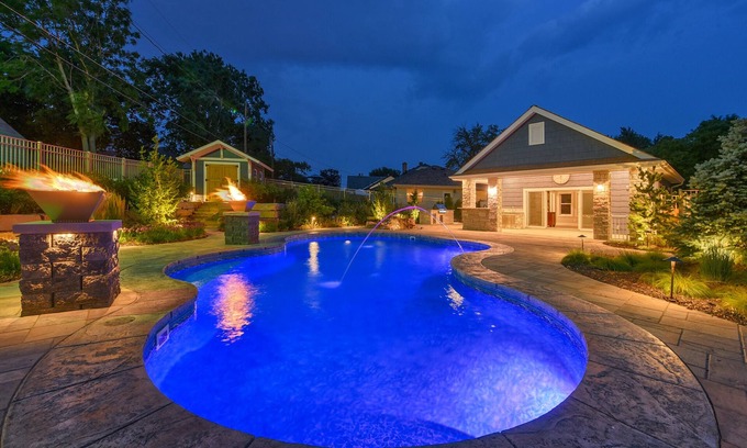 Southeast Omaha Casa | Luxury Oasis Heated Pool, Hot Tub, BBQ