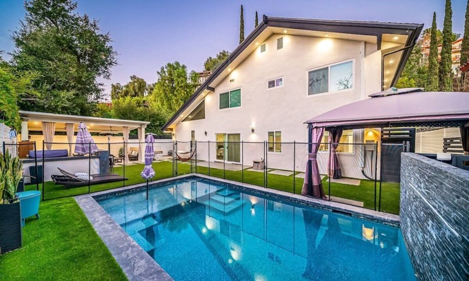 Woodland Hills Casa | Luxury Oasis: Heated Pool & Home Theater