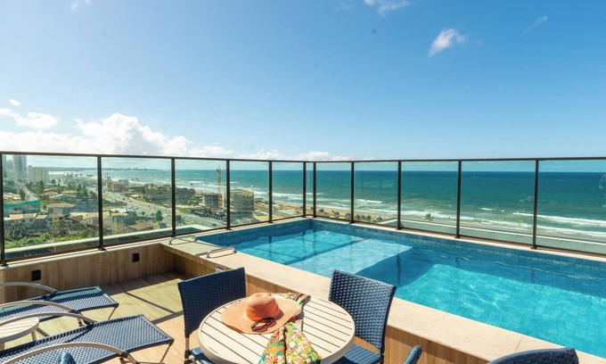 Boca do Rio Apartamento | Luxury on the beach: one-bedroom apartment, AC, swimming pool and 24h concierge
