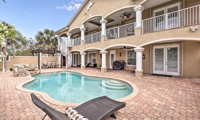 Palm Harbor Casa | Luxury Palm Coast Home with Dock and Game Room!