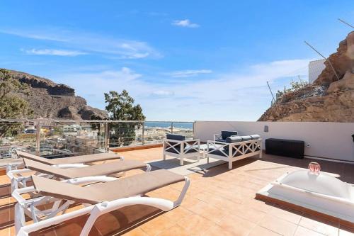 Lomo Quiebre Apartamento | Luxury Penthouse Puerto de Mogan with great terrace and sea view