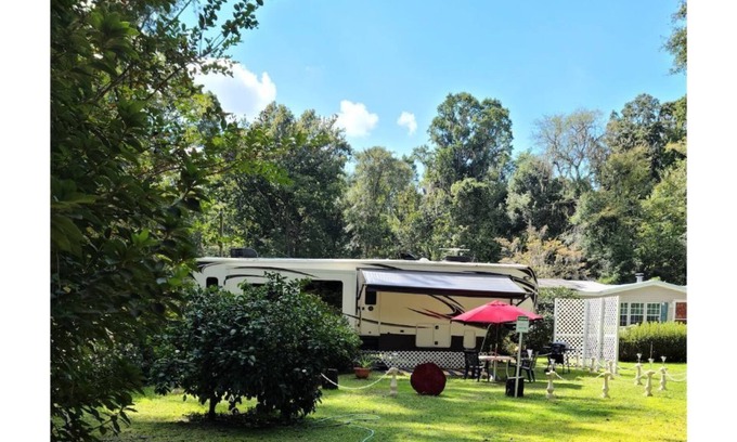 Fort White Casa | Luxury RV on private lot. Peaceful and charming.