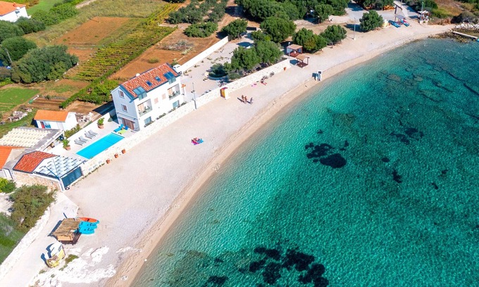 Prizba Villa | Villa de lujo en la playa con impresionantes vistas.