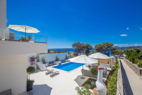Punat Villa | Luxury villa Punat with pool with sea view , 50m from the beach by WiiBuk