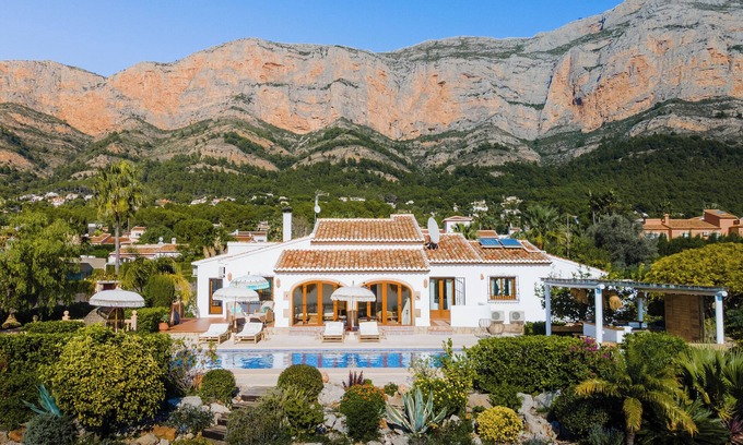 Montgo de Toscamar Villa | Luxury villa with unobstructed views of nature, at the bottom of the Montgo with illuminated pool.
