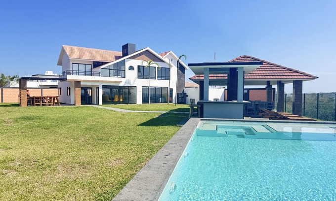 Alvarado Casa | Villa de lujo 🌅 con tina frente a la laguna, alberca, jacuzzi, y horno de pizza