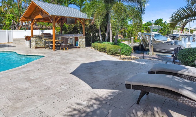 Garden Isles Casa | Luxury Waterfront house/ Heated pool in paradise
