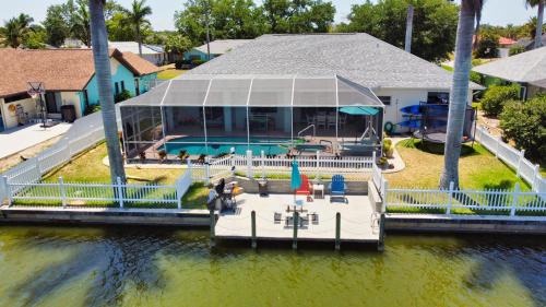 Fort Myers Casa | Luxury Waterfront Vacation Home with Dock and free heated Pool