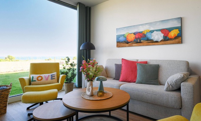 Marienleuchte Apartamento | Lykke vacation apartment - pure sea view. Sauna. Family-friendly.