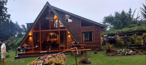 Cantón de Dota Chalet De Esquí | Magic Cabin in Jardín de Dota A real Costa Rican Farm experience with Breakfast included Trout fishing in the lagoon Fruit tasting & beautiful garden with farm animals
