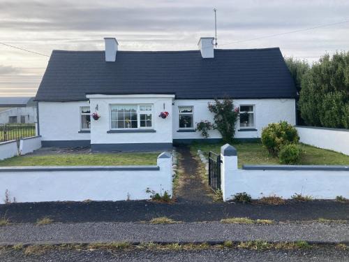 Quilty Casa | Maisie's Seaside Cottage