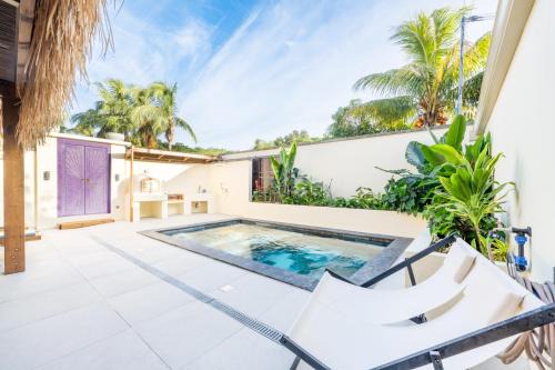 Saint-Louis Casa | Maison balinaise avec piscine chauffée, four à pizza