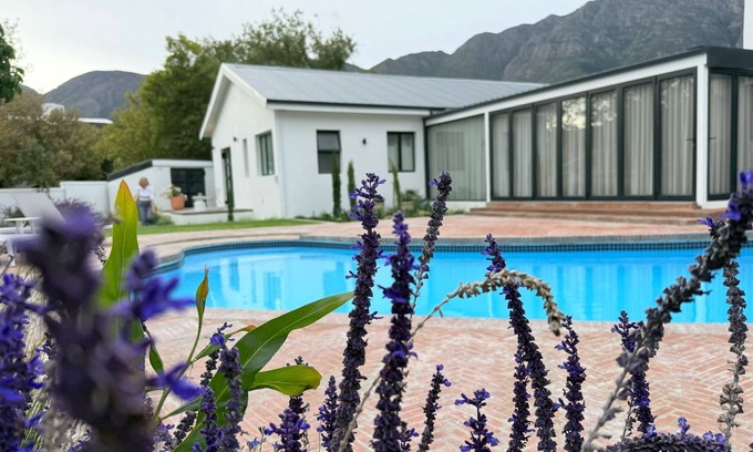 Franschhoek Villa | Maison la Bruyere: Diseñada para amigos, familias y momentos que perduran.