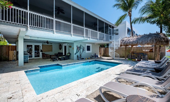 Indian Waterways Casa | Manatee Manor ~ 3 Bedroom Island Home on Plantation Key with Pool & Dockage