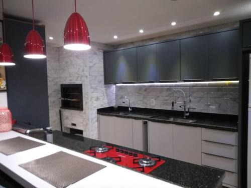 Muquem Casa | Mansão Red Park Floripa