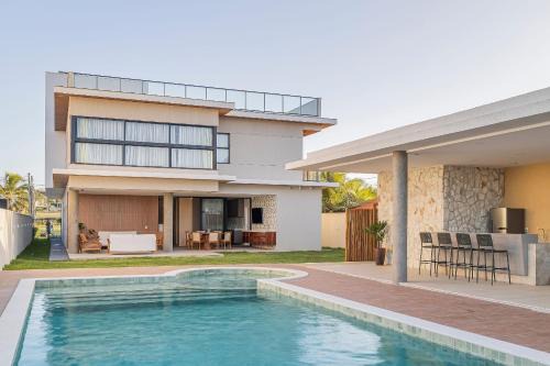 Pecém Casa | Mansão Summerville em Cumbuco por Carpediem