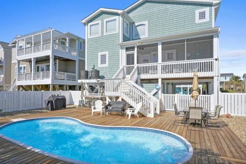 Holden Beach Casa | Marsh Mellowed by the Sea Brunswick Vacation Rentals Privated heated pool and beach