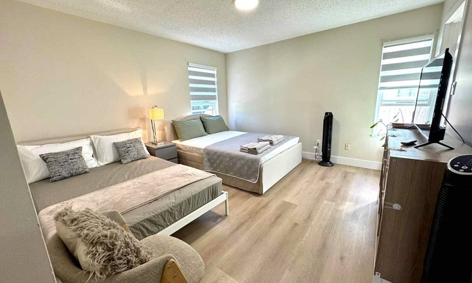 Surrey Casa | Master bedroom with private bathroom in British Columbia, Canada