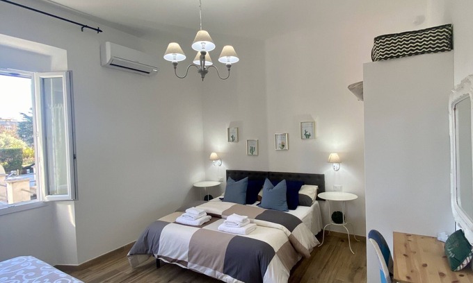 Prenestino-Centocelle Apartamento | MenasiHome Your home just a 2-minute walk from the metro stop.