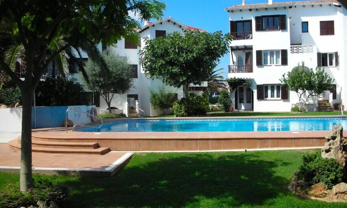 Sol del Este Apartamento | Menorca: hermoso apartamento de 3 dormitorios en planta baja con magníficas vistas