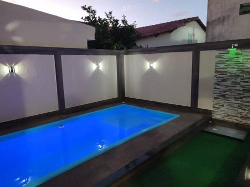 Palmeiras Casa | Meu cantinho com ar e piscina
