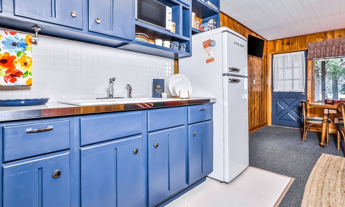 Presque Isle Casa | Mid-century, lakefront suite with lake view, communal dock, rowboats & firepit