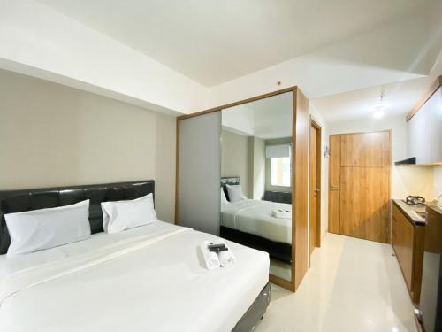 Duren Sawit Apartamento | Minimalist Studio Room Gateway Park LRT City Jatibening Apartment By Travelio