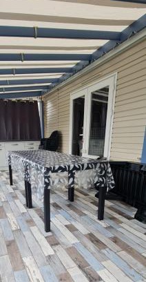 Gastes Otro | Mobil home 693 à la réserve 8 personnes avec terrasse couverte