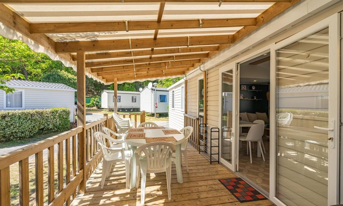 Ronce-les-Bains Alquiler De RV | Mobil Home 'Mh 428 Ronce Les Bains' con piscina compartida, terraza y aire acondicionado